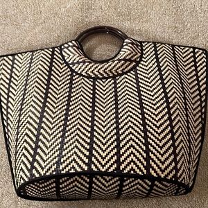 Woven black and tan whicker handbag